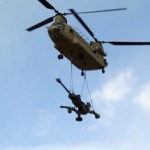 Photo Courtesy of U.S. Army A CH-47 Chinook helicopter airlifts a 155 mm howitzer onto Forward Operating Base Shank, Afghanistan, while being protected from the threat of enemy shoulder launched missiles due to the Common Missile Warning System (CMWS).