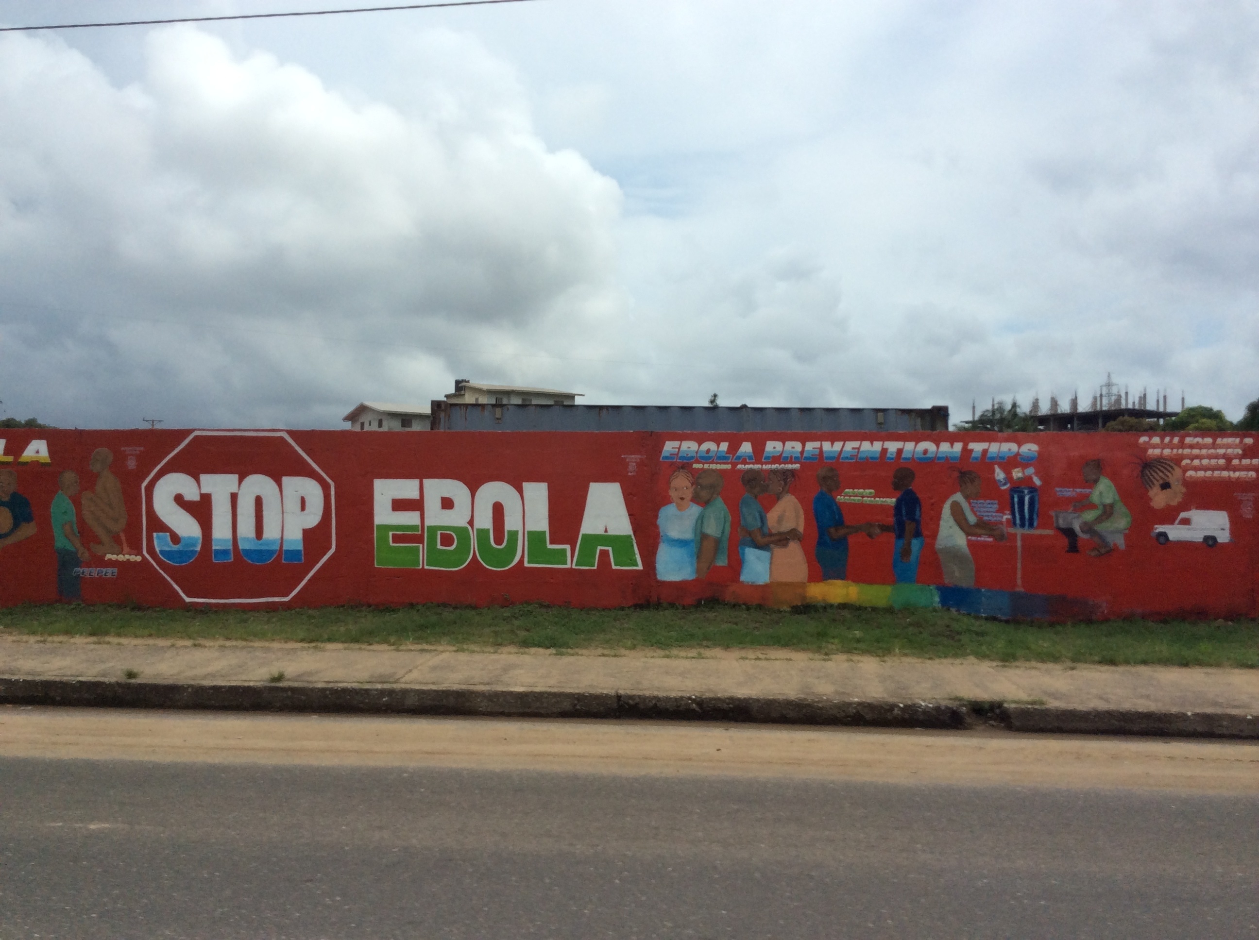 A mural at the outskirts of Monrovia, Liberia, during the Ebola outbreak that affected thousands of Liberians in 2014 and 2015. Aylward was put in charge of the international response to the outbreak after earlier WHO efforts—hobbled by years of budget and staffing cuts—were criticized as tentative and inadequate. (U.S. Army photo by U.S. Army Corps of Engineers, Savannah District)