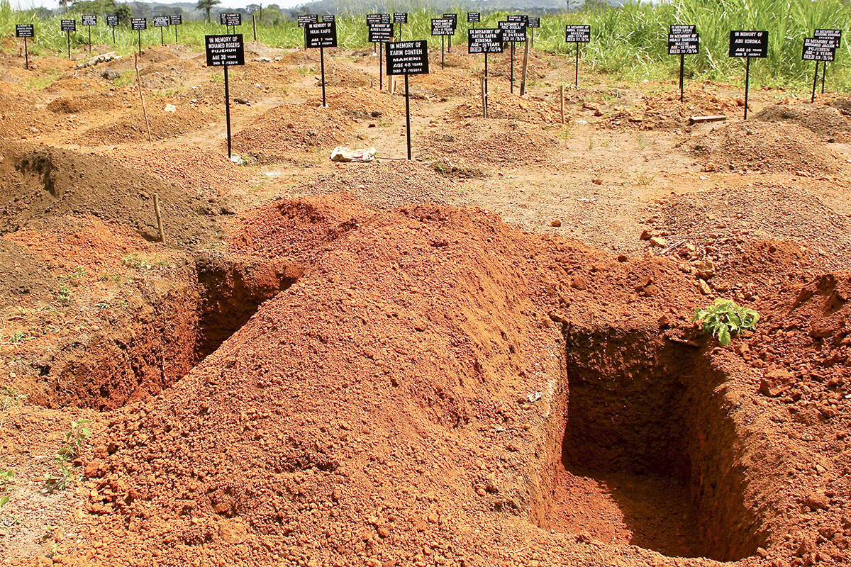 A safe burial site for Ebola victims in Freetown, Sierra Leone. To marshal a diverse coalition of international partners to action, Aylward laid out a straightforward goal to slow the outbreak: get 70 percent of dead bodies buried, and 70 percent of infected people into medical isolation, within 60 days. Prompt, safe burial is important because the Ebola virus can be transmitted to family members preparing a victim’s body for burial. (U.N. photo by Ari Gaitanis)