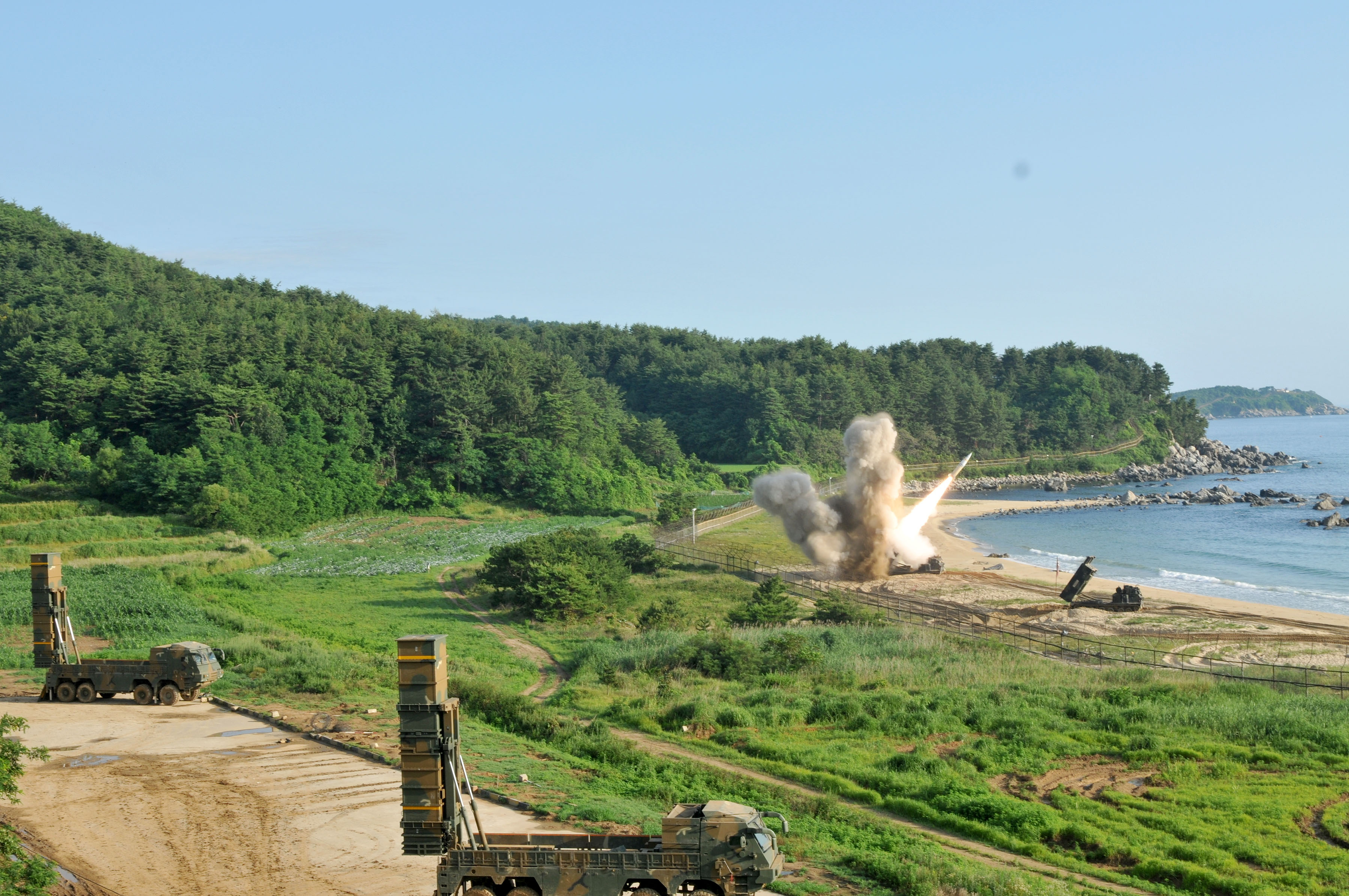 An M270 Multiple Launch Rocket System assigned to the 210th Field Artillery Brigade, 2nd Republic of Korea (ROK)/U. S. Combined Division fires an MGM-140 Army Tactical Missile into the East Sea off South Korea, July 5. The launch demonstrated the deep-strike capabilities that allow the ROK/U.S. alliance to neutralize threats in the region—an important capability given recent technological advances that U.S. adversaries have made while the U.S. has been battling nonstate foes like al-Qaida and the Taliban. (U.S. Army photo by Staff Sgt. Sinthia Rosario, 5th Mobile Public Affairs Detachment)