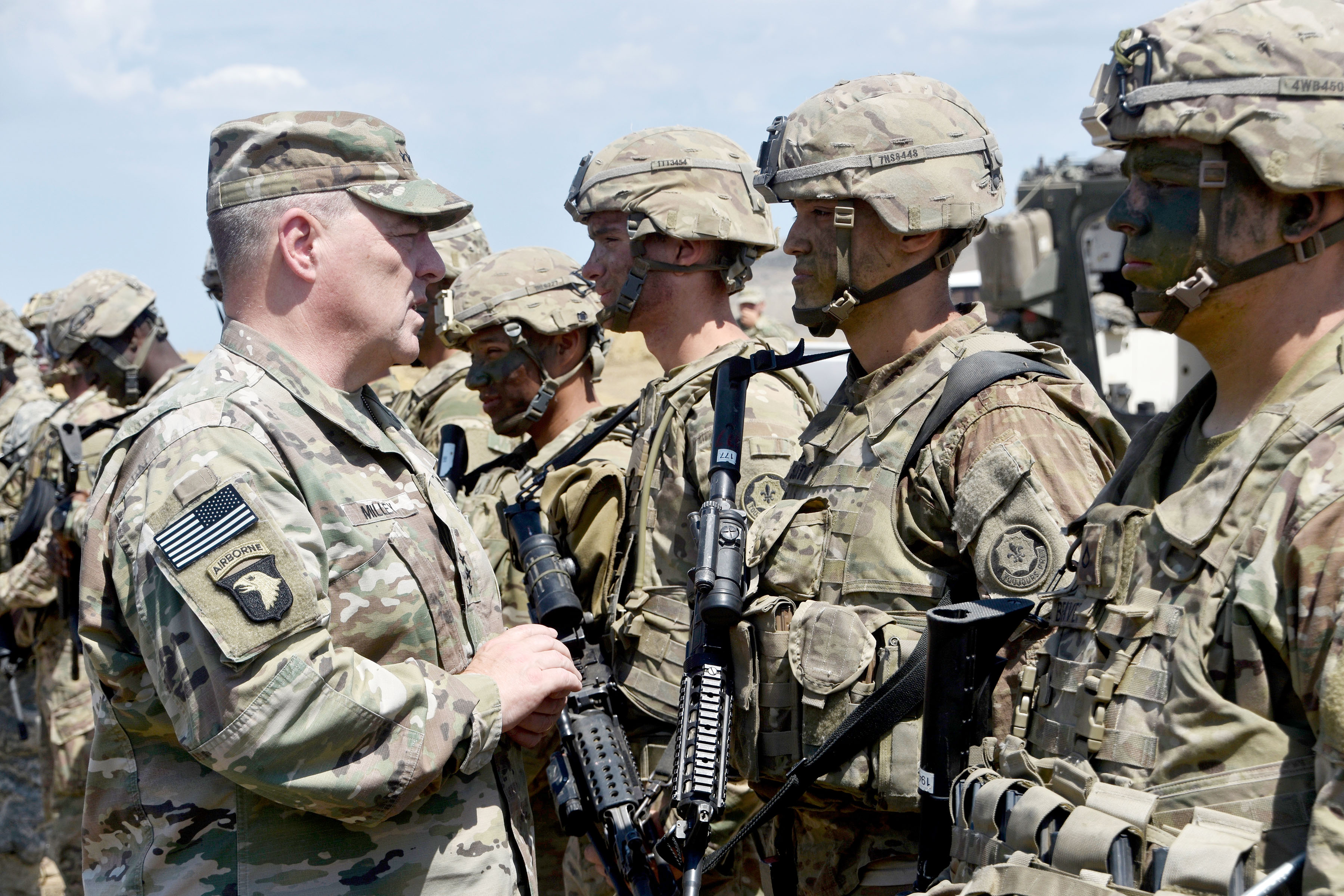 Gen. Mark A. Milley, U.S. Army chief of staff, hands out coins Aug. 10 to Soldiers assigned to 2nd Cavalry Regiment during Exercise Noble Partner 2017 in Vaziani, Georgia. Noble Partner is designed to prepare the Georgian military for its contribution to the NATO Response Force. Milley’s emphasis on readiness as the Army’s No. 1 priority has sparked far-reaching conversation on what readiness is and how it can be achieved. (Photo by Capt. Judith Marlowe, 2nd Cavalry Regiment)