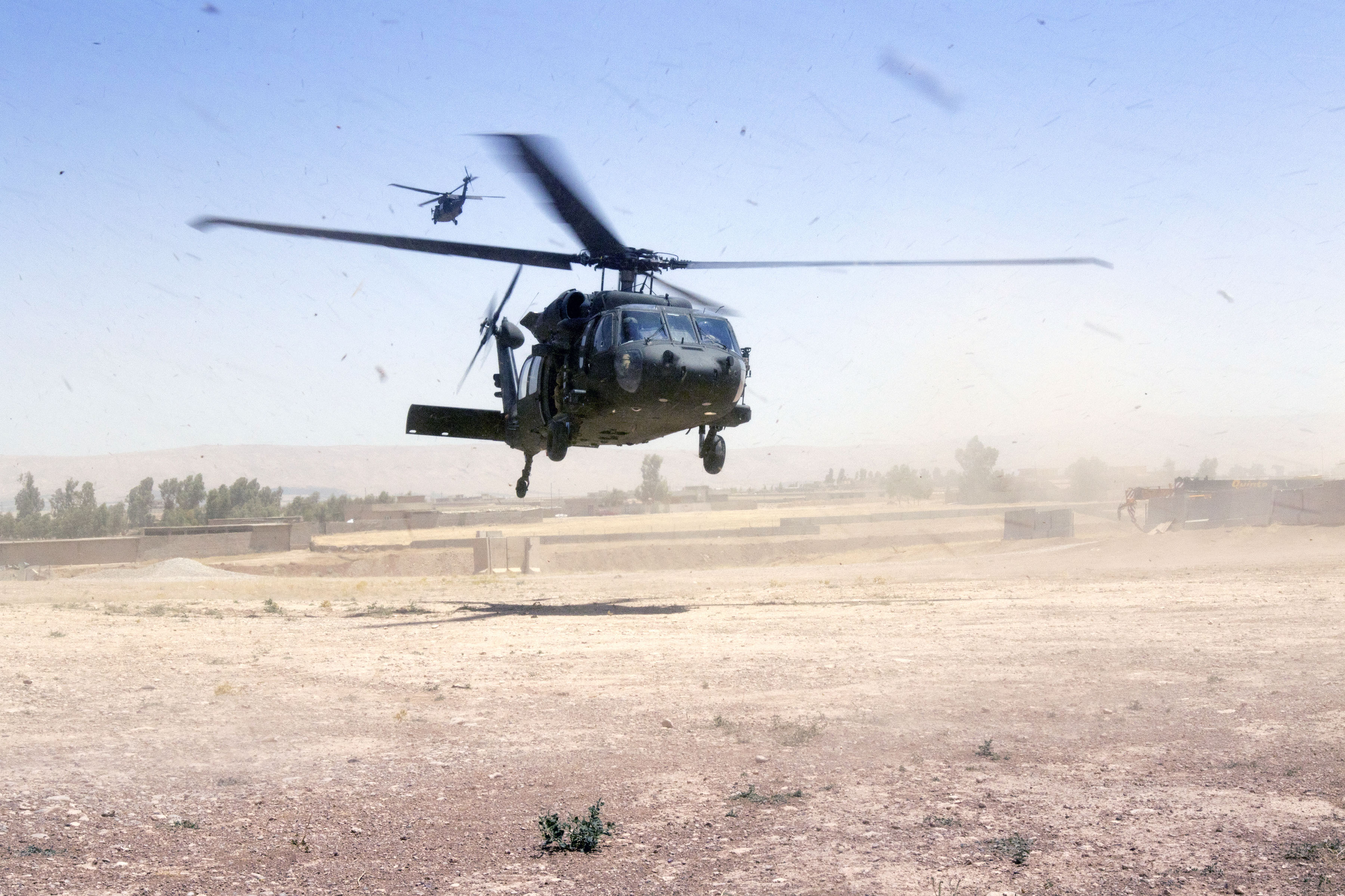 U.S. Army Reserve Soldiers from the 316th Sustainment Command (Expeditionary) (316th ESC) have supported the fight against the Islamic State group in the U.S. Army Central Command area of operations by providing fuel, life support and munitions, including those delivered by these UH-60 Black Hawks to Forward Operating Base Shalalot, Iraq, in July. While the U.S. military has focused on violent extremism, it also faces threats from peer and near-peer adversaries with capabilities designed to limit ability to project U.S. power. (U.S. Army photo by Sgt. Christopher Bigelow, 316th ESC)