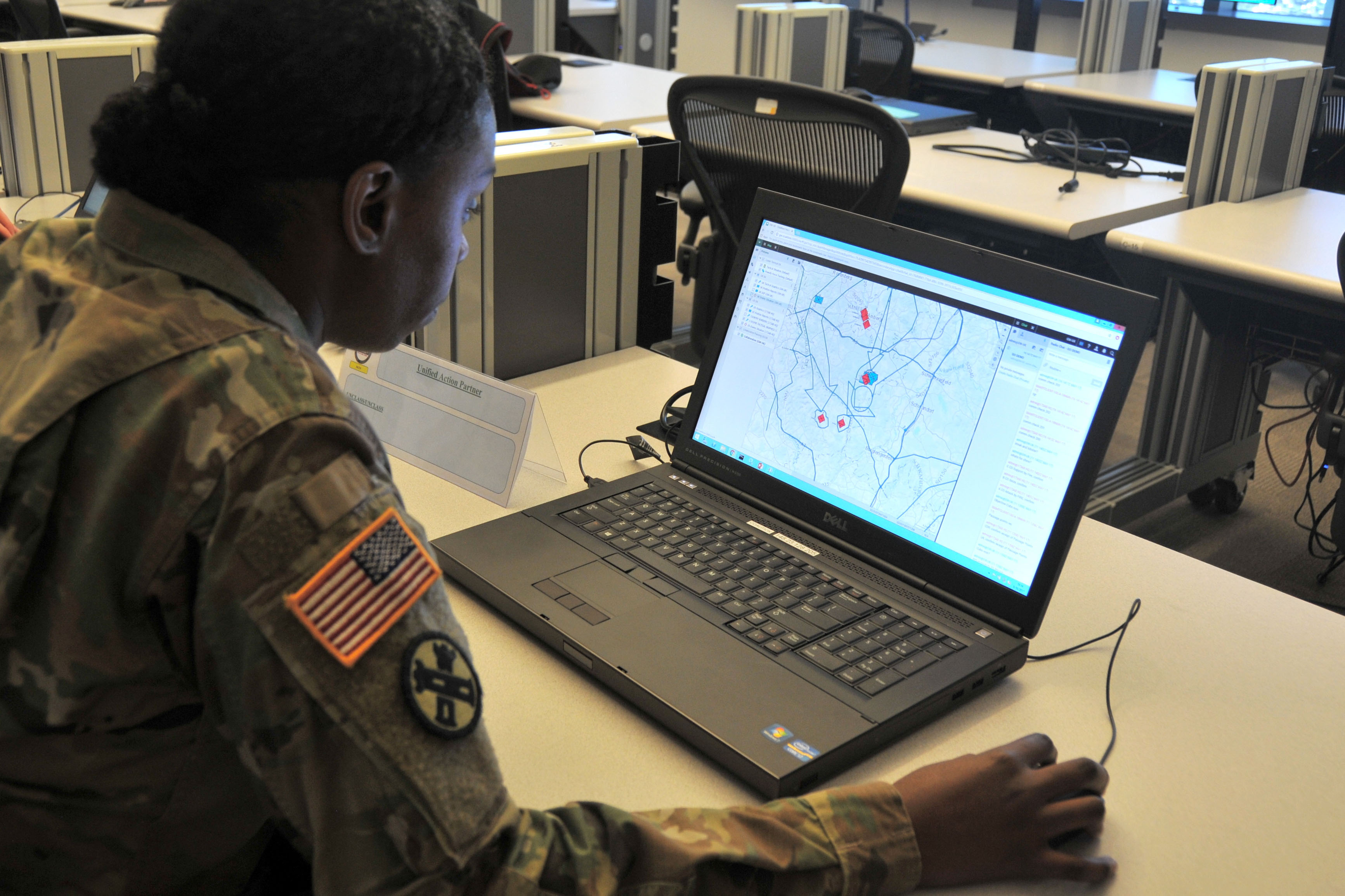 Maj. Summer Favors demonstrates the Command Post Computing Environment prototype at Aberdeen Proving Ground, Maryland, on May 16, 2017. (Photo Credit: Dan Lafontaine (PEO C3T Public Affairs))