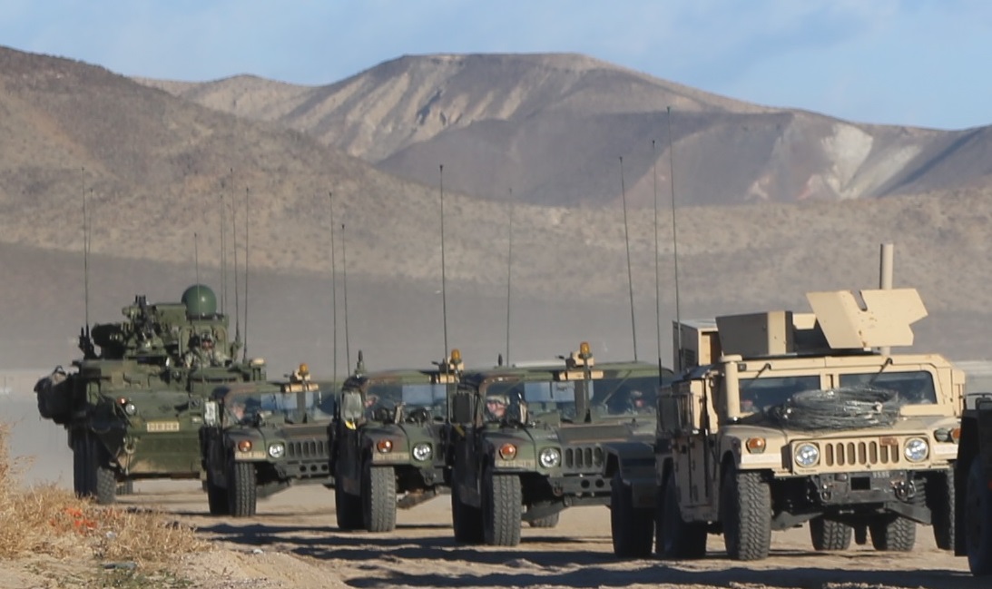 Vehicles equipped with mobile WIN-T, including the Stryker at the end of this convoy at the National Training Center (NTC), Fort Irwin, California, enable mobile mission command, advanced communication and a real-time common operating picture from anywhere on the battlefield. PM Tactical Network will continue to improve WIN-T, as well as the rest of the Army’s tactical network, across all echelons and domains. (U.S. Army photo courtesy of the NTC Operations Group)