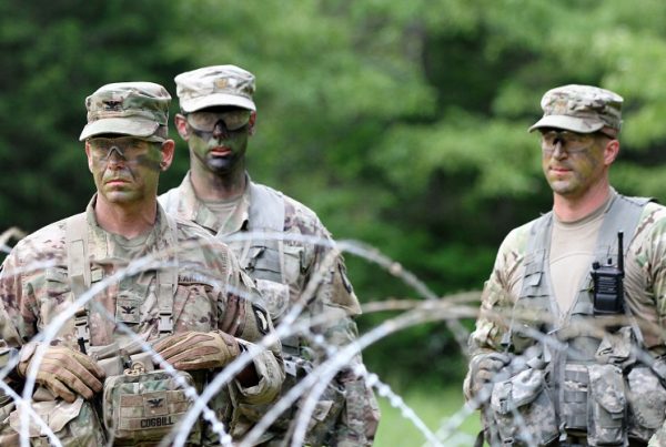 Cogbill, left, along with Maj. Joshua Glonek, right, the 3rd BCT’s operations and training officer, and Maj. Ross Pixler, the operations and training officer of the 3rd Battalion, 187th Infantry Regiment, observe and evaluate company commanders during an exercise in May. The blank-fire exercise tested the companies’ abilities to collectively maneuver on and destroy an enemy force in a simulated combat mission. To ensure overmatch in any battle, Cogbill and the entire BCT have adopted a do-it-yourself approach to making sure the unit has the capabilities it needs. (U.S. Army photo by Staff Sgt. Cody Harding, 3/101)