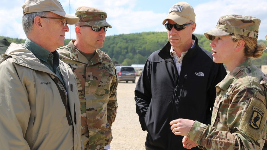 Capt. Brigid Calhoun of the 173rd Infantry Brigade Combat Team (Airborne) briefs, from left, Dr. Bruce D. Jette, assistant secretary of the Army for acquisition, logistics and technology; Brig. Gen. Joel K. Tyler, commanding general of the Joint Modernization Command; and the author in April at Hohenfels, Germany. Various military and civilian officials came to Hohenfels to see how the Joint Warfighting Assessment (JWA) helps the Army evaluate emerging concepts. Among the capabilities evaluated at JWA 18 were improved electronic warfare systems that the Army RCO played a leading role in developing on an accelerated schedule. (U.S. Army photo by Staff Sgt. Kalie Frantz, 55th Combat Camera)