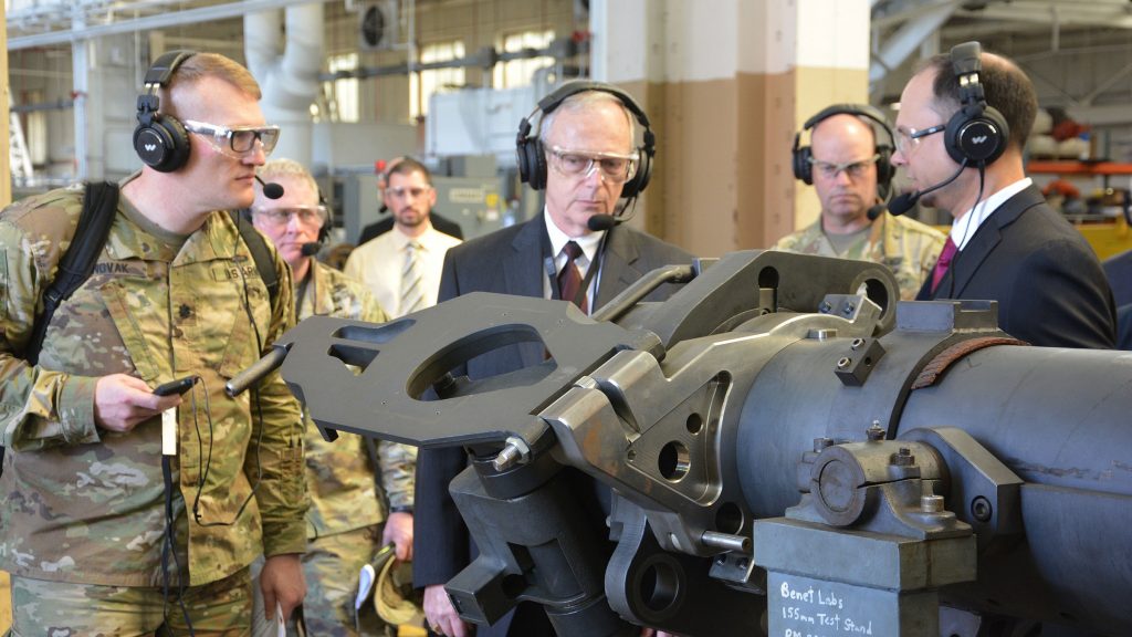 Jette, center, and Lt. Col. Joseph Novak, left, receive a briefing from Nathaniel Klein, right, of Army Benét Laboratories about product improvements for cannon systems on May 8 at Watervliet Arsenal, New York. Novak is with the Program Executive Office for Ground Combat Systems. (Photo by John Snyder, Watervliet Arsenal)