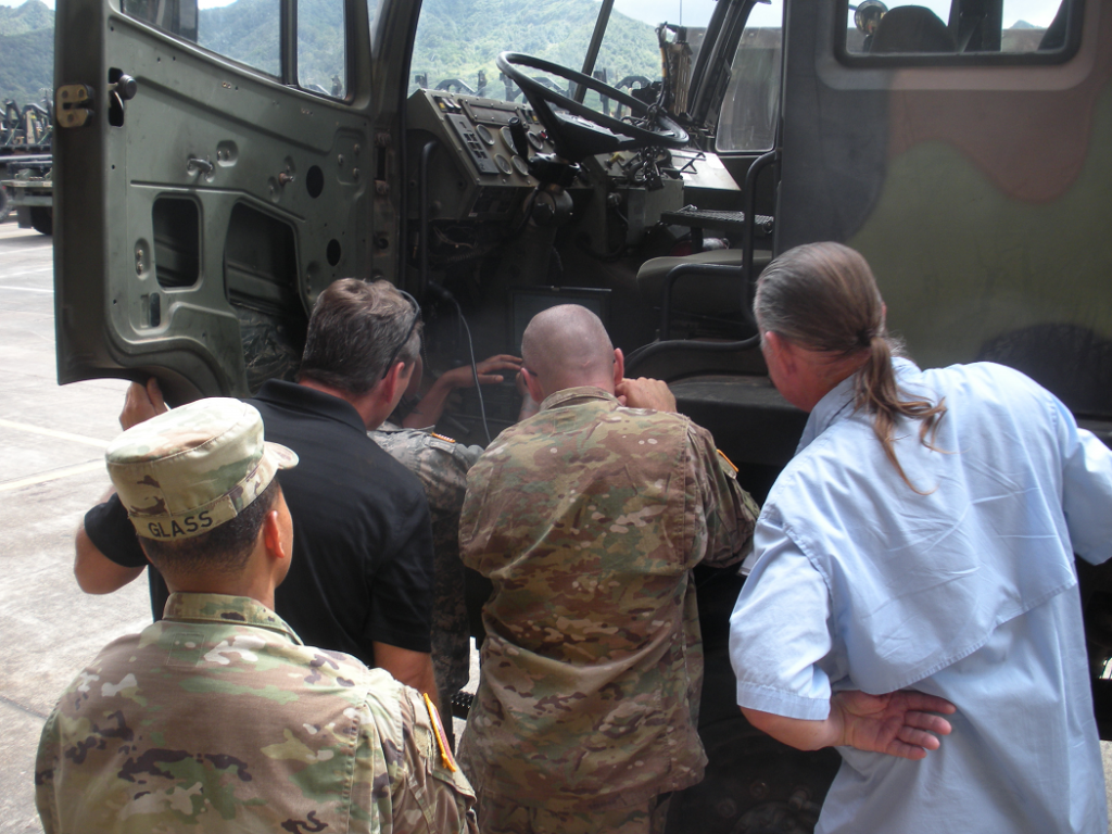 Soldiers from 25th Transportation Company receiving hands-on diagnostics training on M1083 FMTV from AMSAA CBM analysts, Schofield Barracks, HI, August 2016. Photo by Mr. Jesse Fields, AMSAA Operational Sustainment Analysis Team.