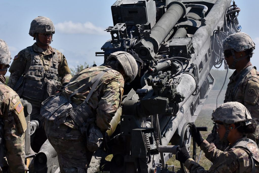 New York National Guard Soldiers assigned to Charlie Battery, 1st Battalion, 258th Field Artillery, load a round into a M777 Howitzer, on Fort Drum, Watertown N.Y., May 22nd, 2018. Soldiers from the 258 spent the past two weeks preparing to fire these weapons, which are much larger, and more powerful than the previous cannon’s they used. (N.Y. Army National Guard photo by Spc. Andrew Valenza)