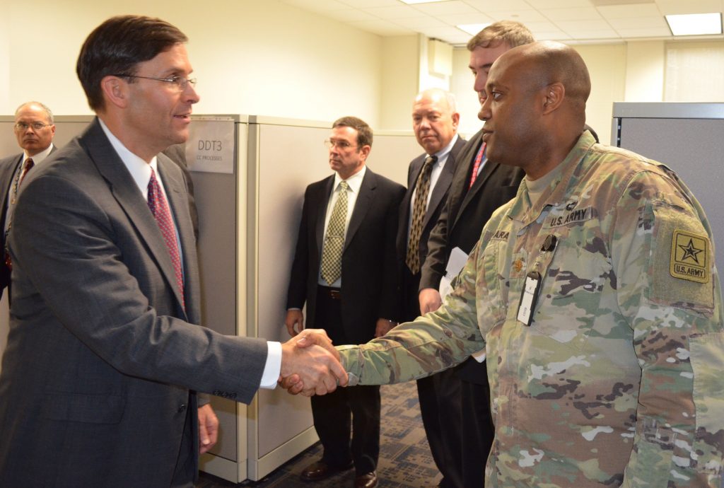 Kamara meets Secretary of the Army Mark T. Esper during Esper’s visit to the Army Futures Command Task Force in Arlington, Virginia, in December 2017. (Photo courtesy of Army Futures Command Public Affairs