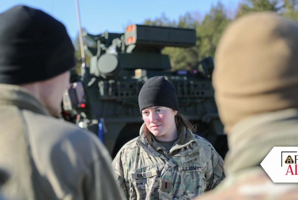 IN BRIEF: First Lt. Kelsea Krauss, assigned to 4th Air Defense Artillery Regiment, briefs Soldiers on an upcoming exercise during Saber Strike 22 at Kazlu Ruda Air Base, Lithuania. The direct release of digitized software puts new capabilities into the hands of Soldiers in as little as half an hour. (Photo by Staff Sgt. Clinton Thompson, 118th Mobile Public Affairs Detachment)