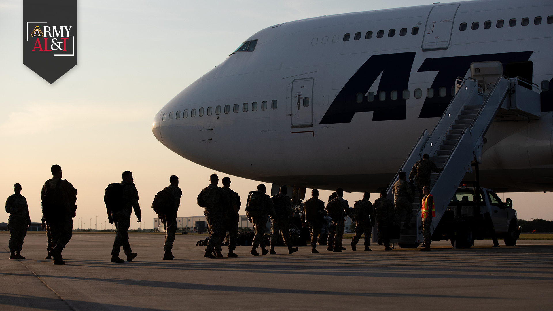 OVERSEAS SUPPORT U.S. Army Soldiers assigned to 3rd Division Sustainment Brigade, 3rd Infantry Division, board a plane to Europe, July 26, 2023. Members of the AMCAG have been in Europe supporting Army, Joint Force and multinational partners through predictive sustainment since August 2022. (Photo by Sgt. Demetrysean Lewis, 3rd Division Sustainment Brigade)