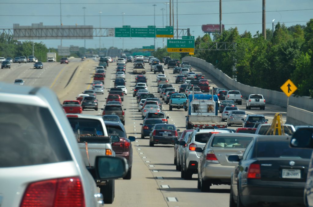 GETTING OUT OF A JAM: Carbon dioxide and methane are the primary greenhouse gases responsible for climate change. Passenger vehicles, including cars and trucks, make up 41% of carbon dioxide emissions. (Photo by Luigi Alvarez, Pexels)