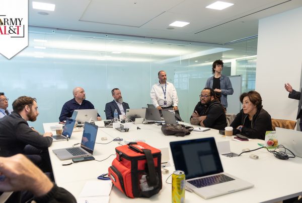 DRAFT OBJECTIVES Product Team One hosts a team breakout session at the program increment planning event where the team’s cross-domain experts and government product owner draft and prioritize their objectives for the next 10 weeks of development. (Photos by Dave MacLuskie, Product Manager ATIS)