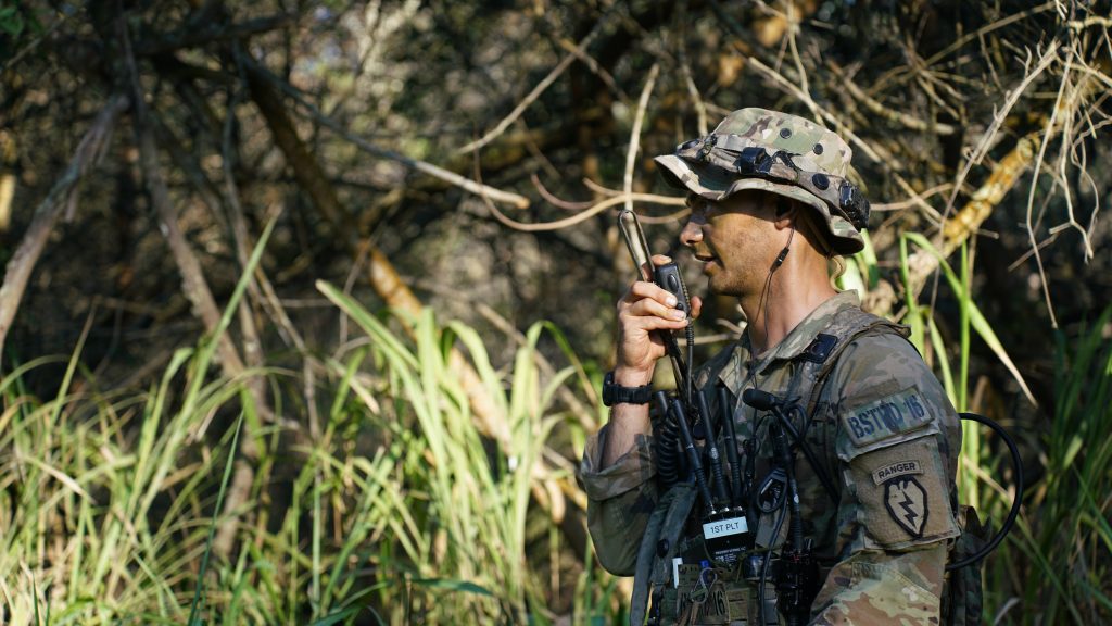 ROGER THATSoldiers with the 3rd Brigade Combat Team, 25th Infantry Division complete an overnight assault mission during the Joint Pacific Multinational Readiness Center at Schofield Barracks, Hawaii, in November 2023. They provided feedback on the Army’s Division Warfighting at Echelon effort, which pushes network complexity up to division. (Photo by Samuel Brooks, PEO C3T Public Affairs) 