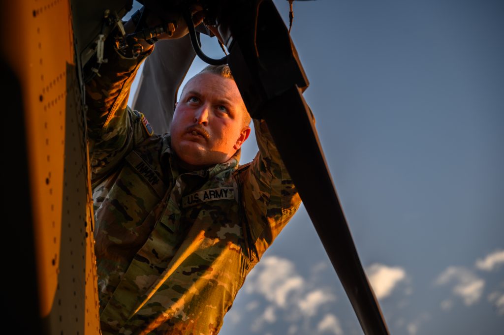 MAINTENANCE MISSIONSgt. Joshua Inman, 1st Battalion, 150th Assault Helicopter Regiment, New Jersey Army National Guard, performs maintenance on a UH-60 Black Hawk helicopter at the Army Aviation Support Facility on Joint Base McGuire-Dix-Lakehurst, New Jersey, Nov. 7, 2023. Griffin uses AI/ML algorithms to predict maintenance needs. (Photo by Spc. Michael Schwenk, U.S. Army National Guard) 