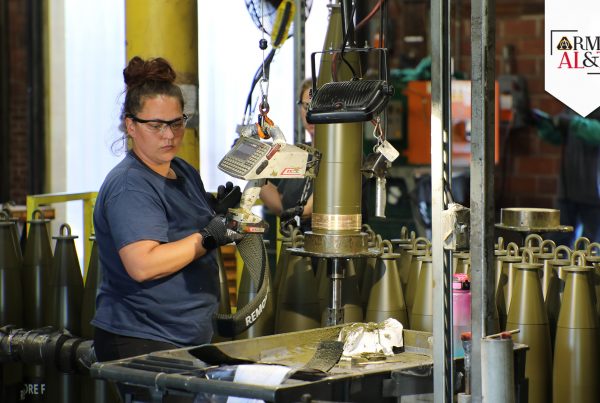 PACK OUT An IAAAP employee prepares 155 mm rounds for load, assemble and pack, May 15, 2024. (Photo by Dori Whipple, Joint Munitions Command, Public and Congressional Affairs)