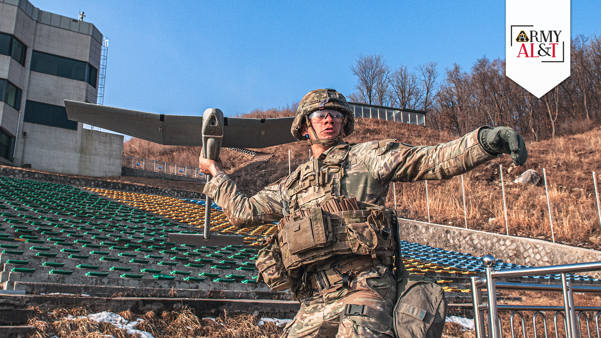 SHOULDERING THE BURDEN Sgt. Elijah Tovar with the 2nd Squadron of the 3rd Cavalry Regiment Fox Crew, prepares to launch an RQ-11 Raven drone to conduct surveillance in the training area and locate possible targets during Freedom Shield 24, March 14, 2024, in South Korea. (Photo by Spc. Victoria Morgan, 100th Mobile Public Affairs Detachment)