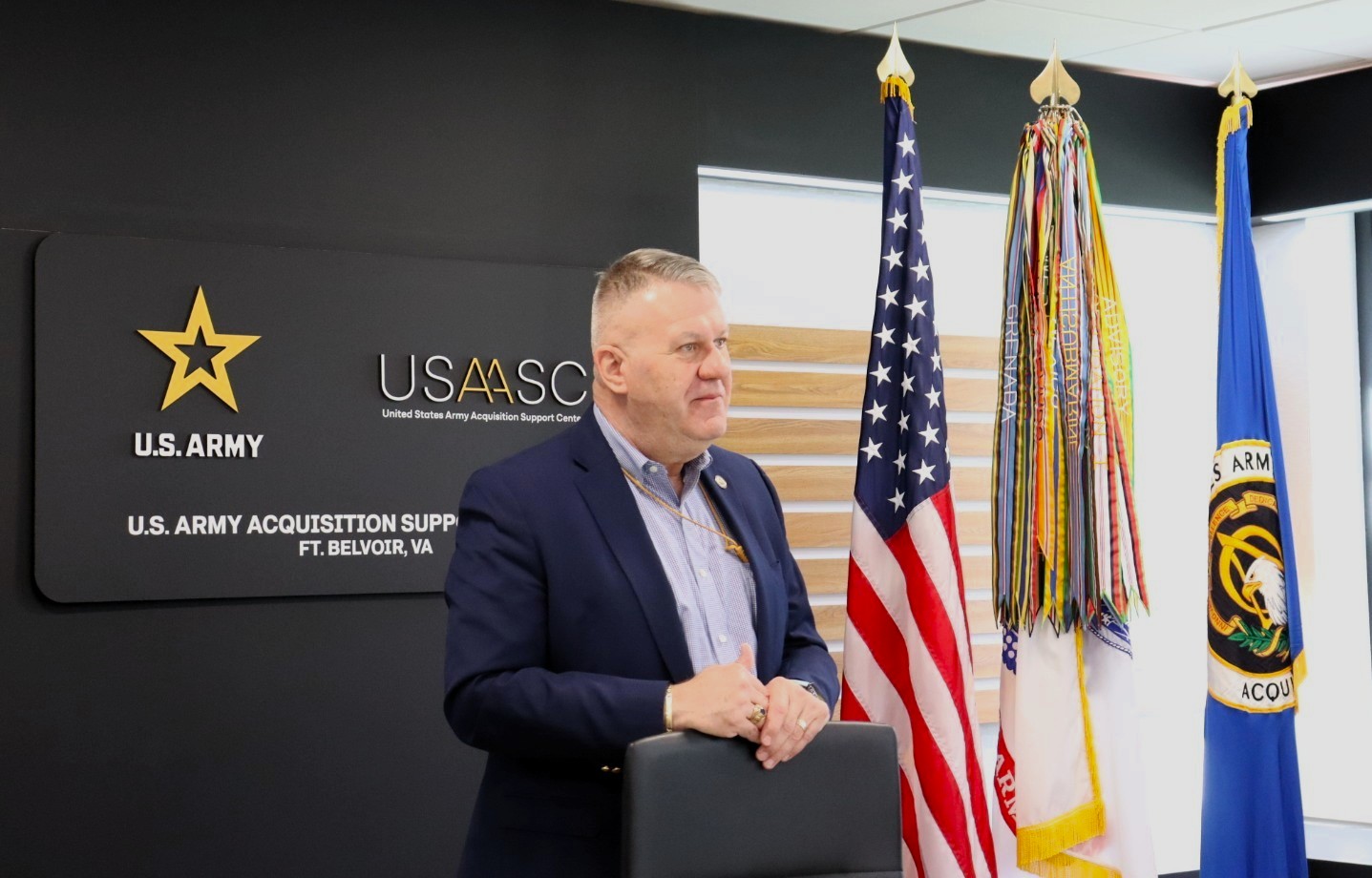 Lead-Graduation-Richardson, Caption: Mr. Rob Richardson, Director of Acquisition Career Management (DACM), addressing the graduates and attendees.