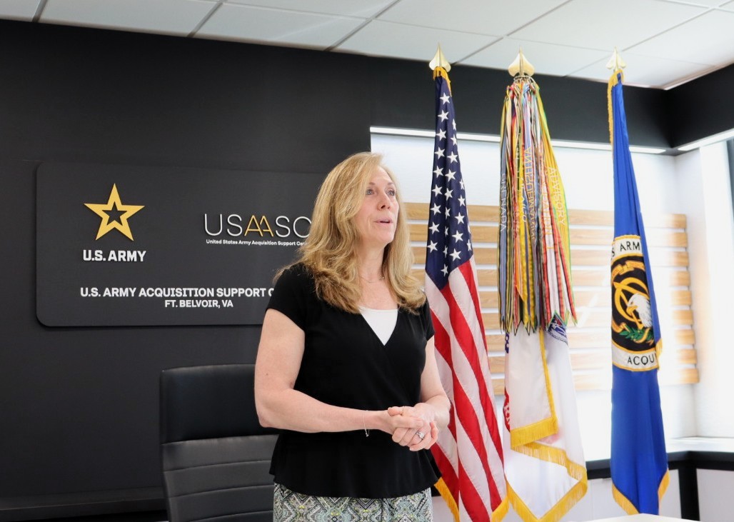 Lead-Graduation-DeGuzman, Caption: Vicky DeGuzman, Chief, Workforce Development & Engagement Division at the DACM Office giving opening remarks.