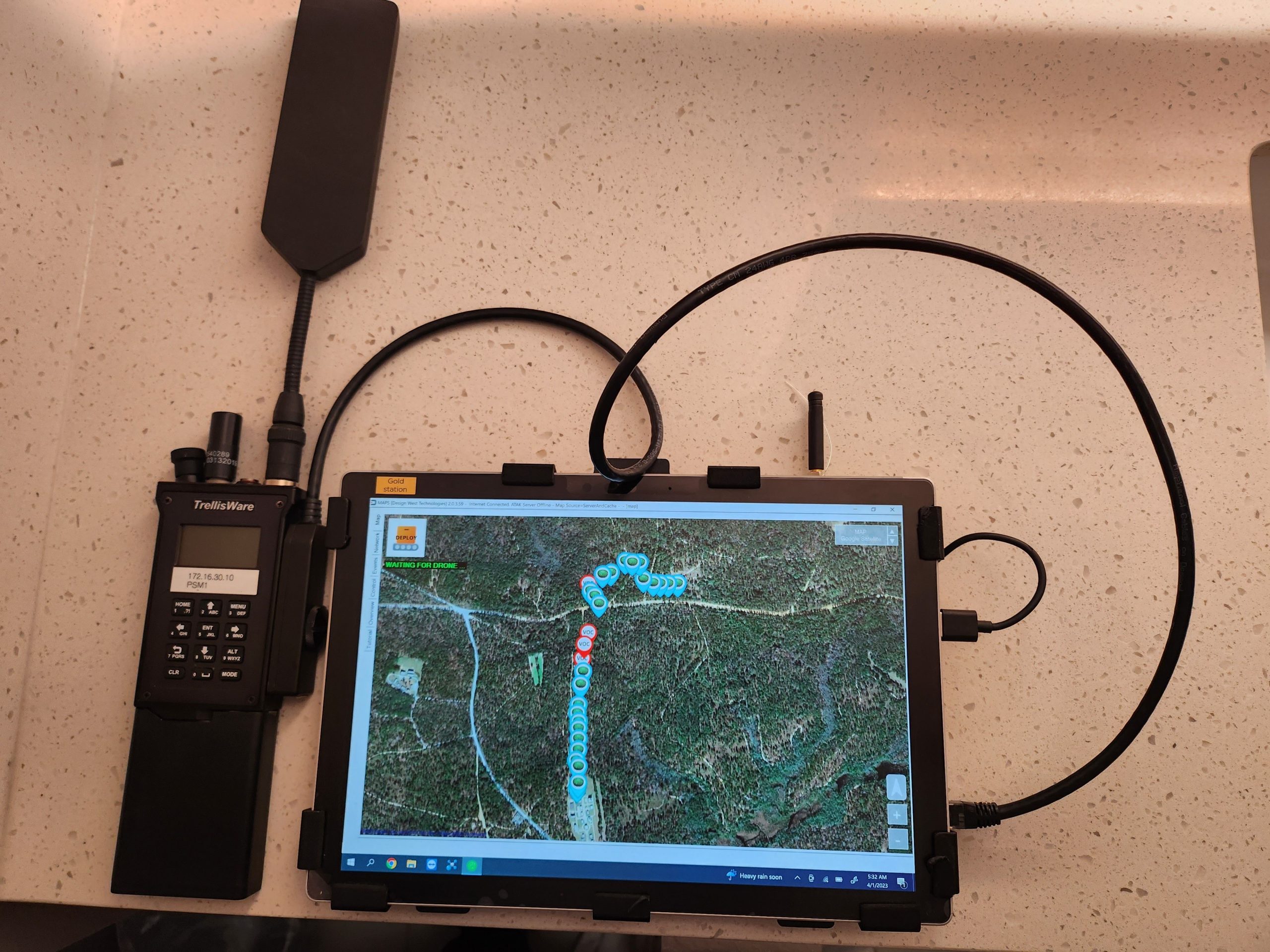 A VIRTUAL VIEW: A MESH network device displays a virtual view of the puck array deposited by a quadcopter at the Army Expeditionary Warrior Experiments annual event at the Maneuver Support Center of Excellence at Fort Leonard Wood, Missouri, in March 2023. (Photo by U.S. Army)