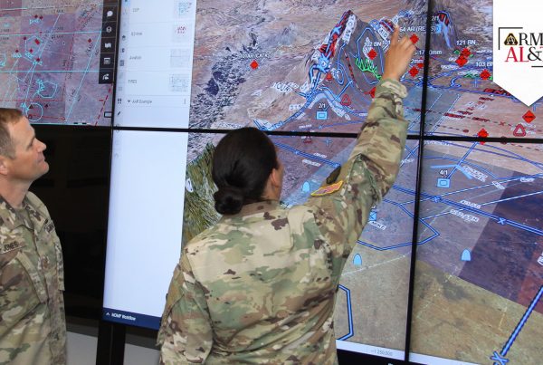 MAP BREAK: Soldiers at the Tactical Systems Integration Facility at Aberdeen Proving Ground, Maryland, use digital planning platforms to project live geospatial, weather and force structure data onto a map. (Photo by Dan Lafontaine, DEVCOM C5ISR Center)