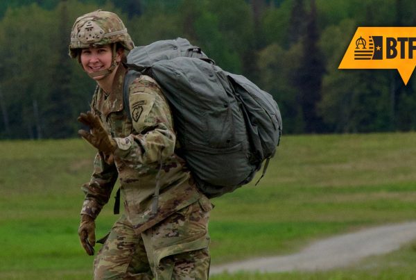 Maj. Mary Lord leaving the drop zone after a successful UH-60 jump in June 2016 at Joint Base Elmendorf-Richardson.
