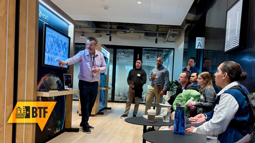 TWI fellows observe a demonstration of ESRI during a tour of Microsoft’s Innovation Hub during the January 2026 Midpoint Review.