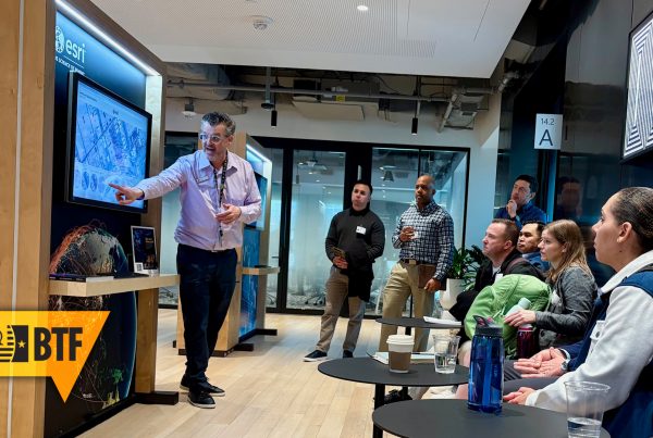 TWI fellows observe a demonstration of ESRI during a tour of Microsoft’s Innovation Hub during the January 2026 Midpoint Review.