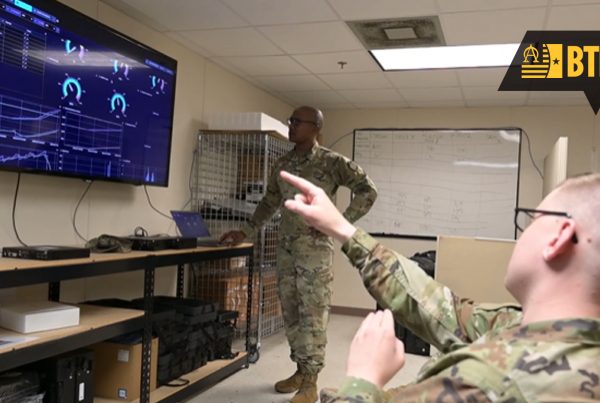 BTF Featured image of 2 men discussing what is happening on the tv screen
