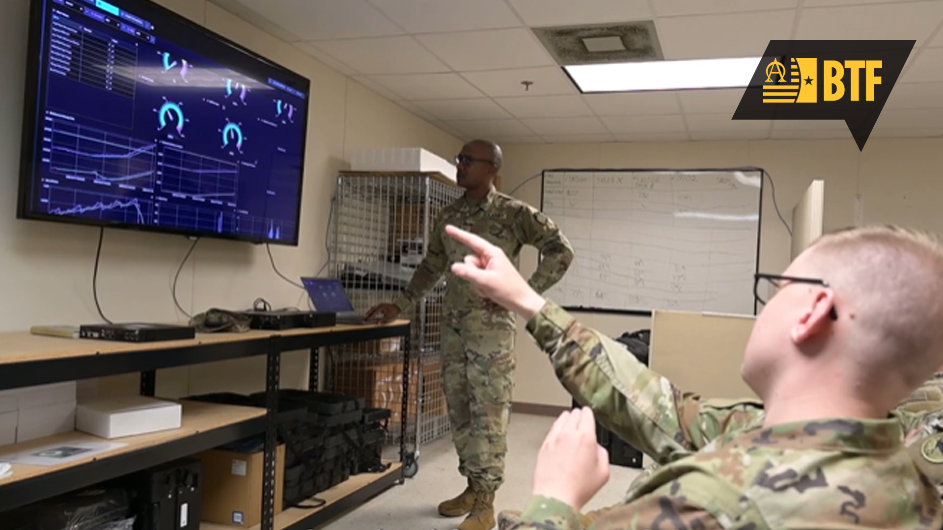 BTF Featured image of 2 men discussing what is happening on the tv screen
